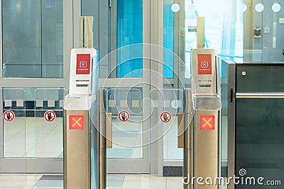 Missed flight concept, being late to flight. Red Cross the passage is closed sign Empty gateway terminal area in airport, closed Stock Photo