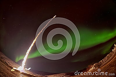 Missile launch at night with aurora polaris. Stock Photo