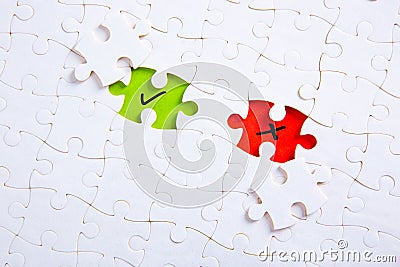 Missing puzzle pieces with check mark and cross symbols. Approve or reject, right or wrong, yes or no Stock Photo