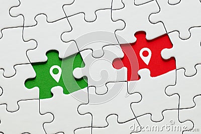 Missing puzzle pieces with map pin location pointer icons. GPS navigation technology Stock Photo
