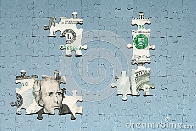 missing puzzle pieces on top of US dollar banknote, concealment of income, default concept Stock Photo