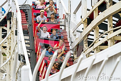 MISSION BAY, CA-USA-11 JULY 2018- People ride Giant Dipper Roller Coaster at Belmont Park. Several are screaming. The Mission Editorial Stock Photo