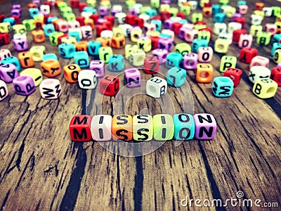 MISSION word of colourful cube alphabets. Stock Photo