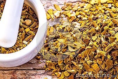 Mistletoe, medicinal herb dried with mortar Stock Photo