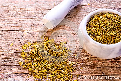 Mistletoe, medicinal herb dried with mortar Stock Photo