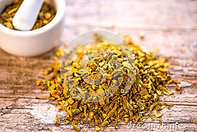 Mistletoe, medicinal herb dried with mortar Stock Photo