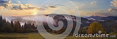 Misty early daybreak panorama in autumn Carpathian mountain, Ukraine Stock Photo