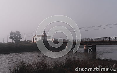 Misty morning with abandoned bidge Stock Photo