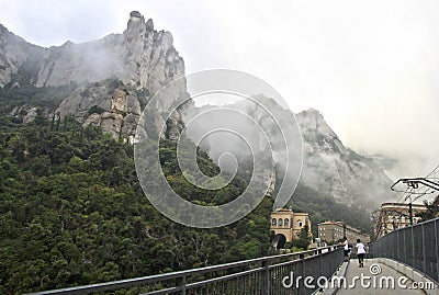 Misty morning in the Montserrat mountains at Benedictine abbey Santa Maria de Montserrat, Spain Editorial Stock Photo