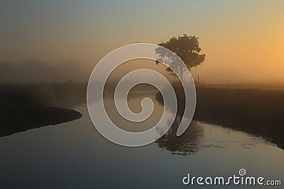 Misty morning over river Axe Stock Photo