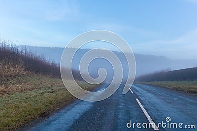 Misty road leading to anywhere Stock Photo