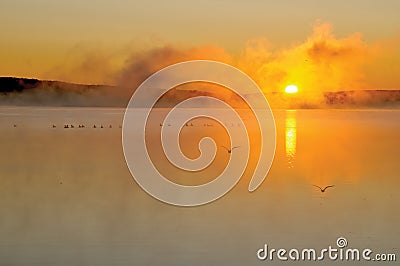 Misty sunrise Stock Photo