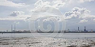 Misty view on Poolberg power generation station and industrial harbor infrastructure Editorial Stock Photo