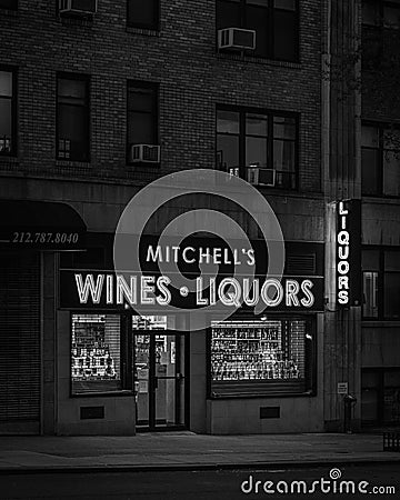 Mitchells Wines & Liquors neon sign at night in the Upper West Side, Manhattan, New York City Editorial Stock Photo
