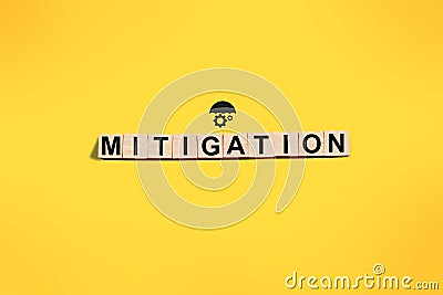 Mitigation text on wooden, business term Stock Photo
