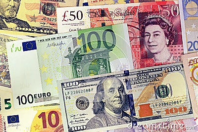 Mix of currencies banknotes - Dollar, Pound Sterling, Euro Editorial Stock Photo