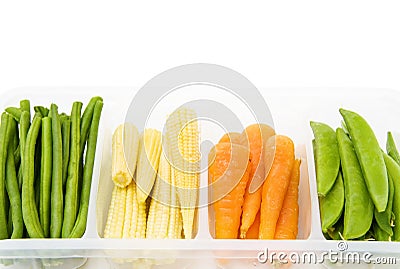 Mix of fresh baby vegetables Stock Photo