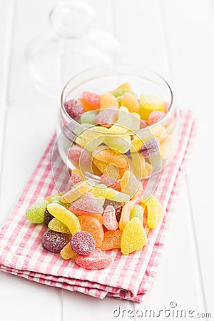 Mix of fruity jelly candy on checkered napkin Stock Photo