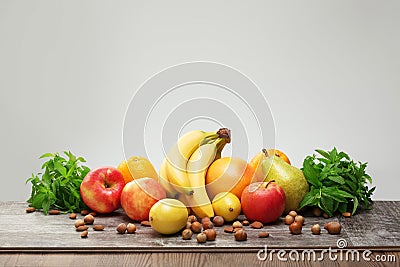 Mix of healthy fruits on the table. Photo of food on a dark background Stock Photo