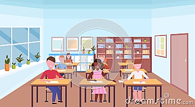 Mix race pupils sitting desks and doing tasks during lesson education concept modern school classroom interior Vector Illustration