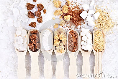 Mix of sugar varieties: unbleached, brown and white, refined and unrefined, granulated and cubes Stock Photo