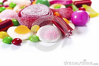 Mixed colorful candies isolated on white Stock Photo