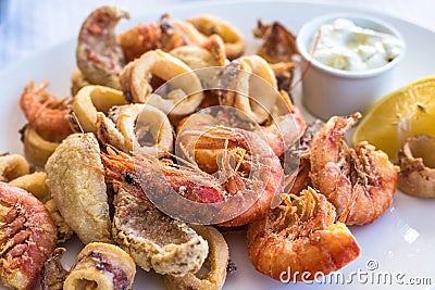 Mixed deep-fried fish, shrimp and squid platter Stock Photo