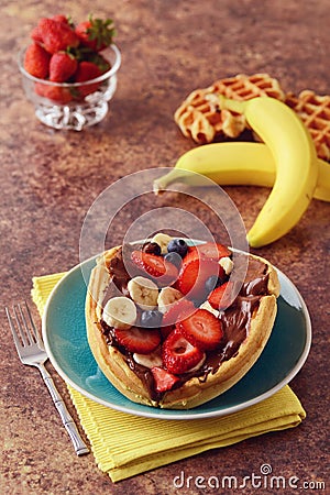 Mixed fruit waffle sandwich with chocolate spread Stock Photo