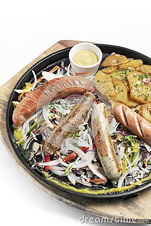 Mixed german traditional organic sausage and potato meal platter Stock Photo