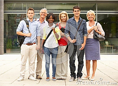 Mixed group of students outside college Stock Photo