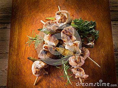 Mixed meat skewer on wooden Stock Photo