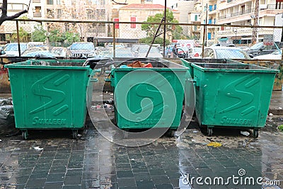 Mixed municipal solid waste containers awaiting collection in Beirut, Lebanon Editorial Stock Photo
