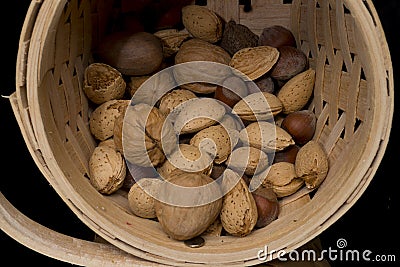 Mixed nuts in basket Stock Photo