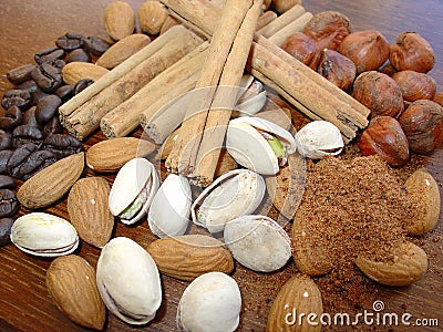 Mixed nuts, cinnamon & coffee Stock Photo