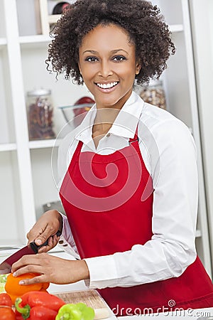Mixed Race African American Woman Cooking Kitchen Stock Photo