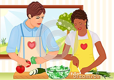 Mixed race young couple cooking fresh salad Stock Photo