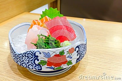 Mixed sashimi; hirame, salmon and tuna sashimi, served with wasabi Stock Photo