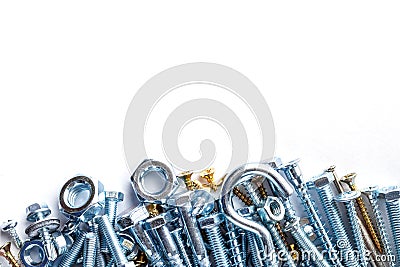 Mixed screws and nails. Industrial background. Home improvement.bolts and nuts.Close-up of various screws. Use for background, top Stock Photo