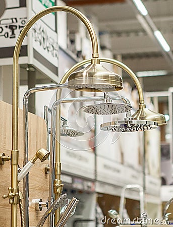 Mixers taps for shower in a hardware store Stock Photo