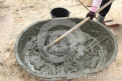 Mixing a cement in salver Stock Photo