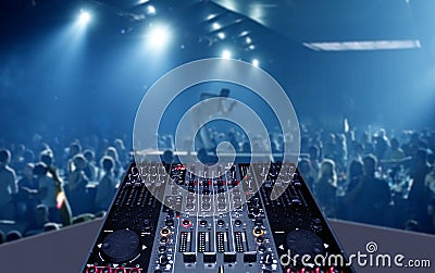 Mixing desk in nightclub party with lightshow Stock Photo