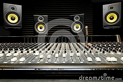 Mixing desk with speakers Stock Photo