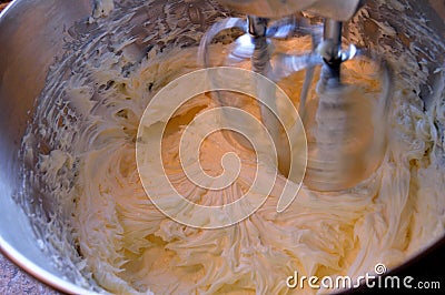 Mixing icing in stand mixer Stock Photo
