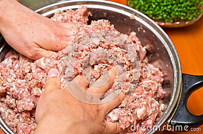 Mixing minced meat Stock Photo