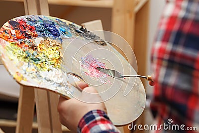 Mixing of oil paints Stock Photo