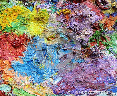 Mixing oil paints on a palette. Stock Photo