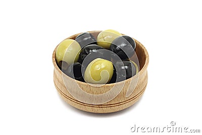 A mixture of black and green olives wooden bowl Stock Photo