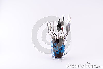 Mixture of different kinds and sizes of spatula on a white background Stock Photo