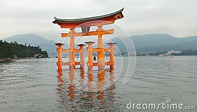 Tori gate at sea on Miyajima, Hiroshima Stock Photo