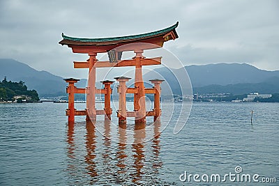 Tori gate at sea on Miyajima, Hiroshima Stock Photo